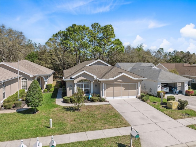 single story home featuring a shingled roof, concrete driveway, a front yard, stucco siding, and an attached garage