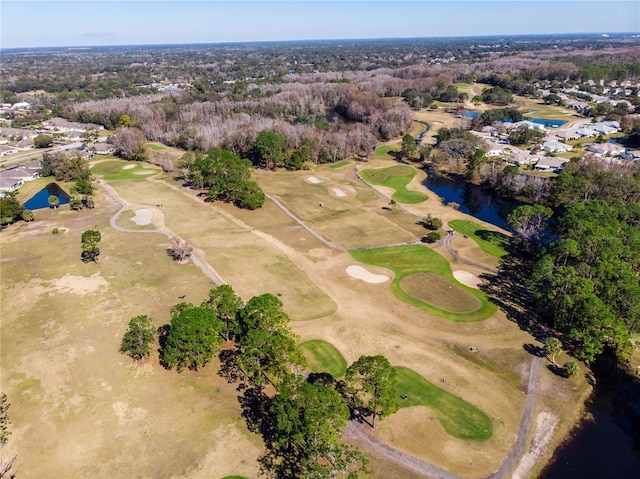 bird's eye view with a water view and golf course view