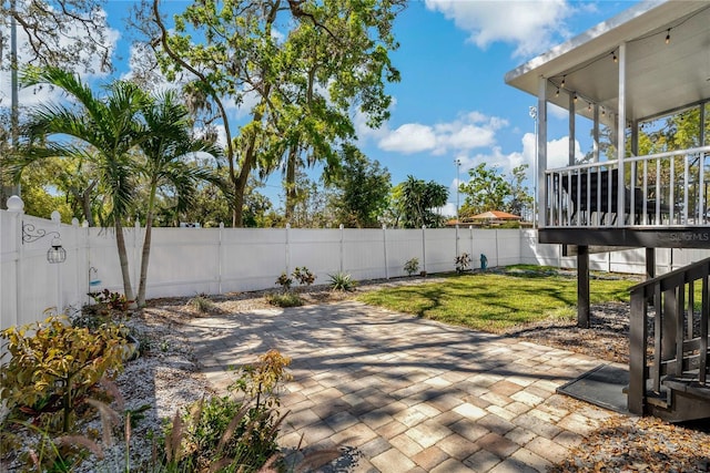 view of patio with a fenced backyard