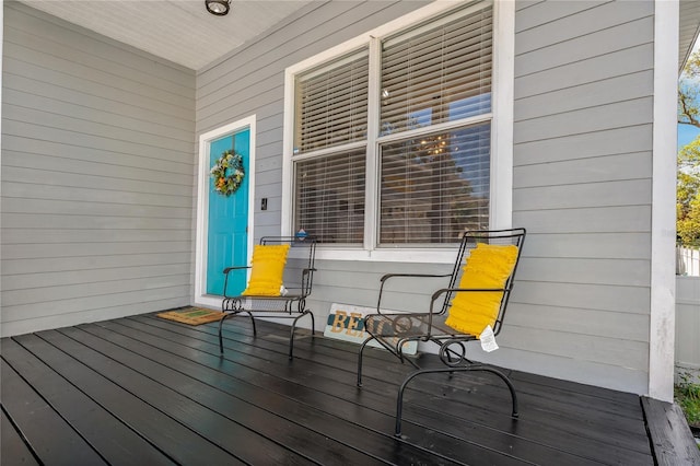 wooden deck featuring a porch