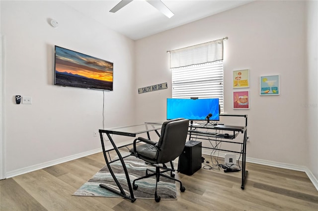 office with ceiling fan, baseboards, and wood finished floors