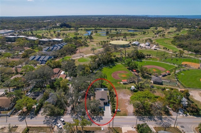 aerial view with a water view and golf course view