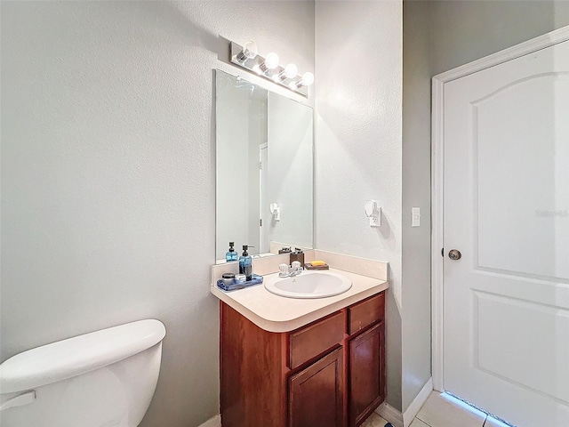 half bath with toilet and vanity