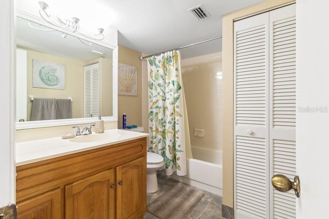 full bathroom with a closet, toilet, visible vents, and vanity