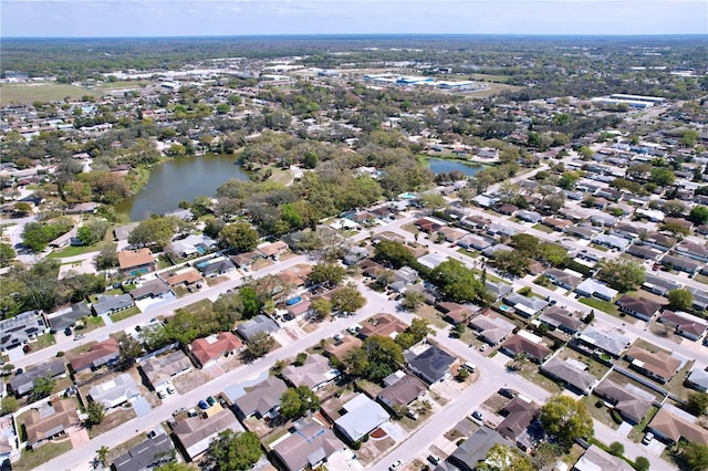 bird's eye view with a water view and a residential view