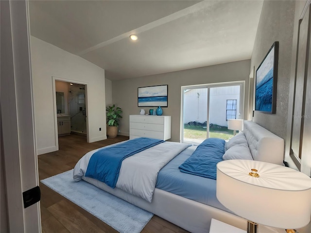 1032 Concert Ave, Spring Hill, FL 34609 - bedroom featuring baseboards, ensuite bathroom, lofted ceiling, and wood finished floors