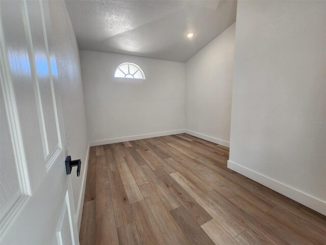 1032 Concert Ave, Spring Hill, FL 34609 - unfurnished room featuring wood finished floors and baseboards