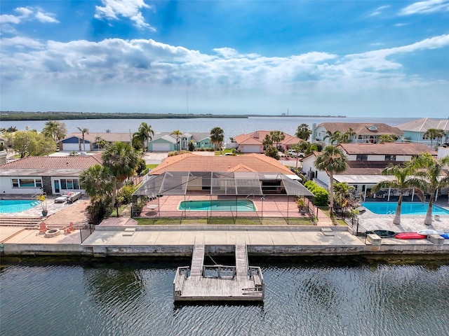 aerial view featuring a residential view and a water view