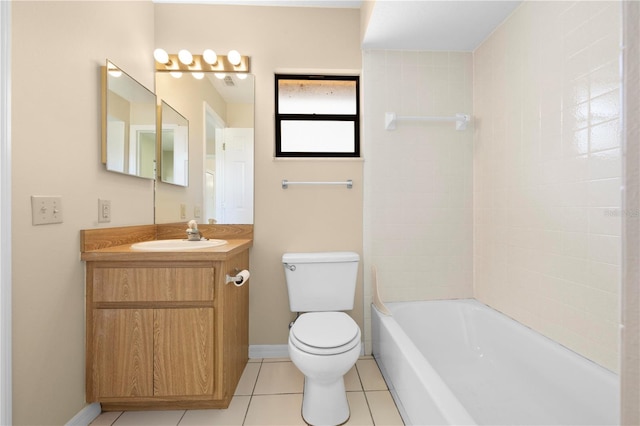 bathroom with vanity, baseboards,  shower combination, tile patterned flooring, and toilet