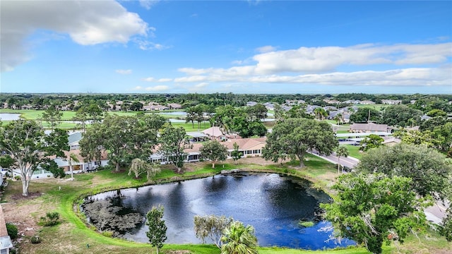 birds eye view of property featuring a water view and a residential view