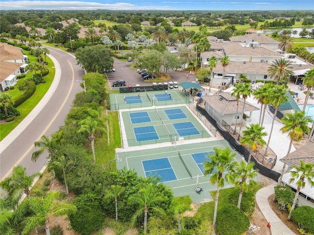 birds eye view of property with a residential view