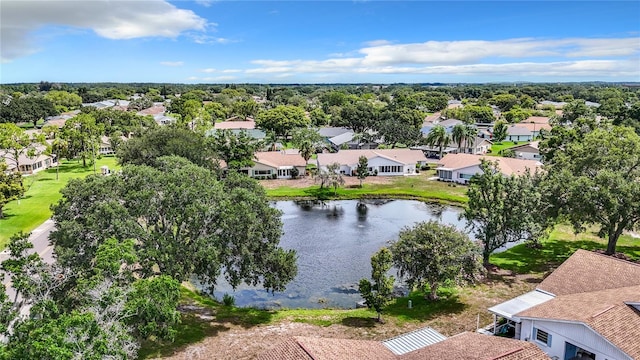 bird's eye view with a residential view and a water view