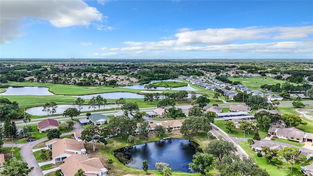 bird's eye view with a residential view, a water view, and view of golf course