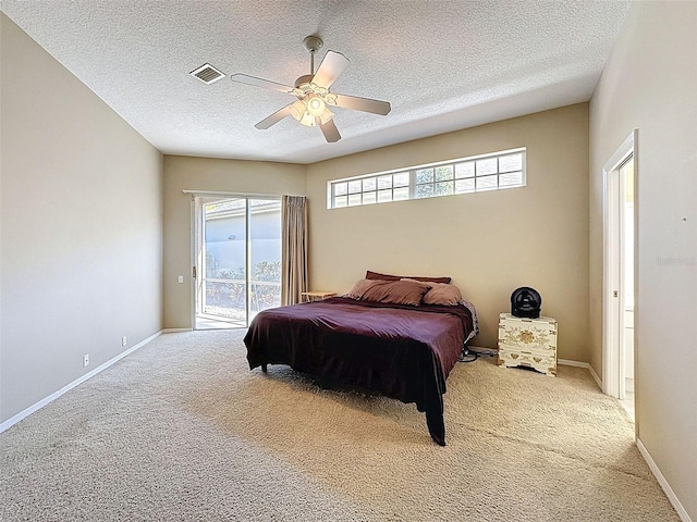 bedroom featuring visible vents, multiple windows, light colored carpet, and access to outside