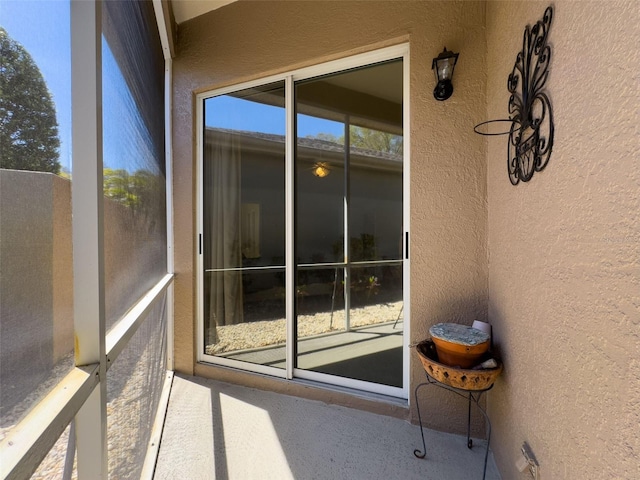 unfurnished sunroom featuring a wealth of natural light