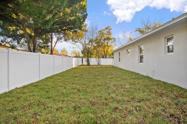 view of yard featuring a fenced backyard