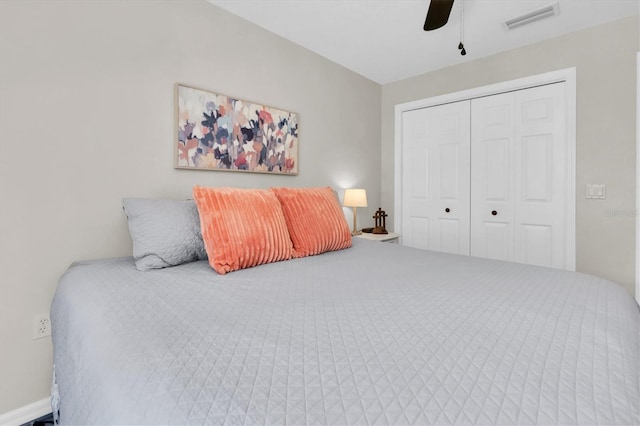 bedroom featuring visible vents, a closet, and ceiling fan