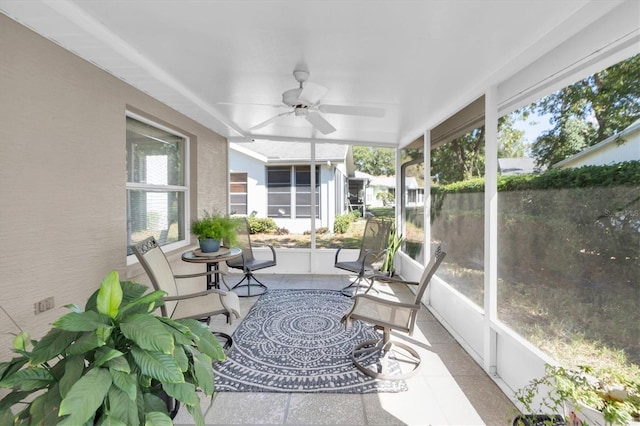 sunroom / solarium with ceiling fan