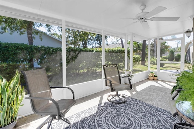 sunroom / solarium with ceiling fan