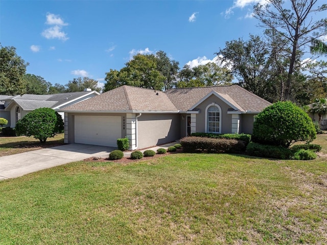 single story home featuring a shingled roof, concrete driveway, a front yard, stucco siding, and an attached garage