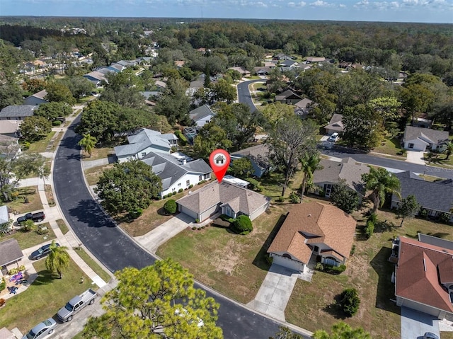 birds eye view of property with a residential view