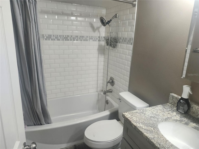 full bath featuring a textured wall, toilet, shower / bath combo with shower curtain, and vanity