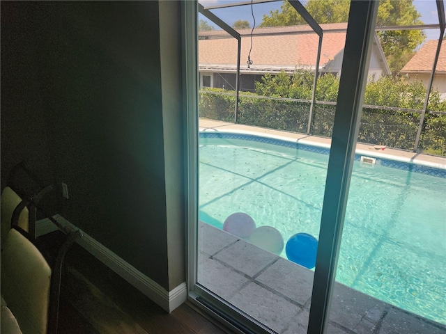 outdoor pool featuring a lanai