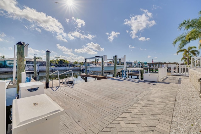 view of dock with a water view and boat lift