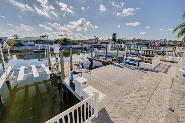 view of dock featuring a water view and boat lift