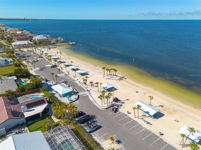 bird's eye view with a view of the beach and a water view