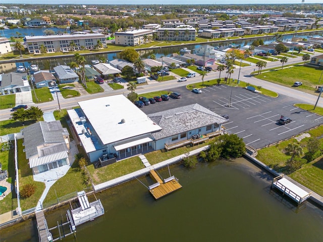 aerial view with a residential view and a water view