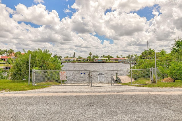 water view with a gate and fence