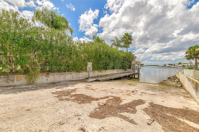 dock area featuring a water view