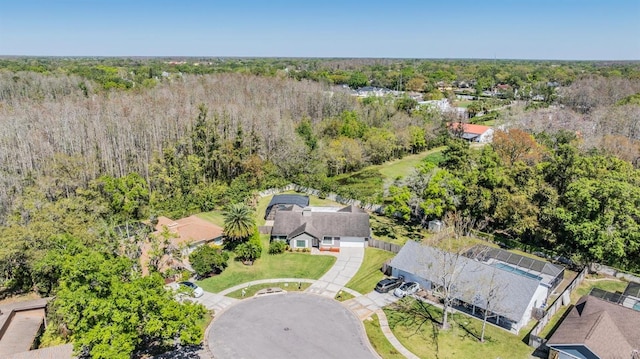 drone / aerial view with a view of trees