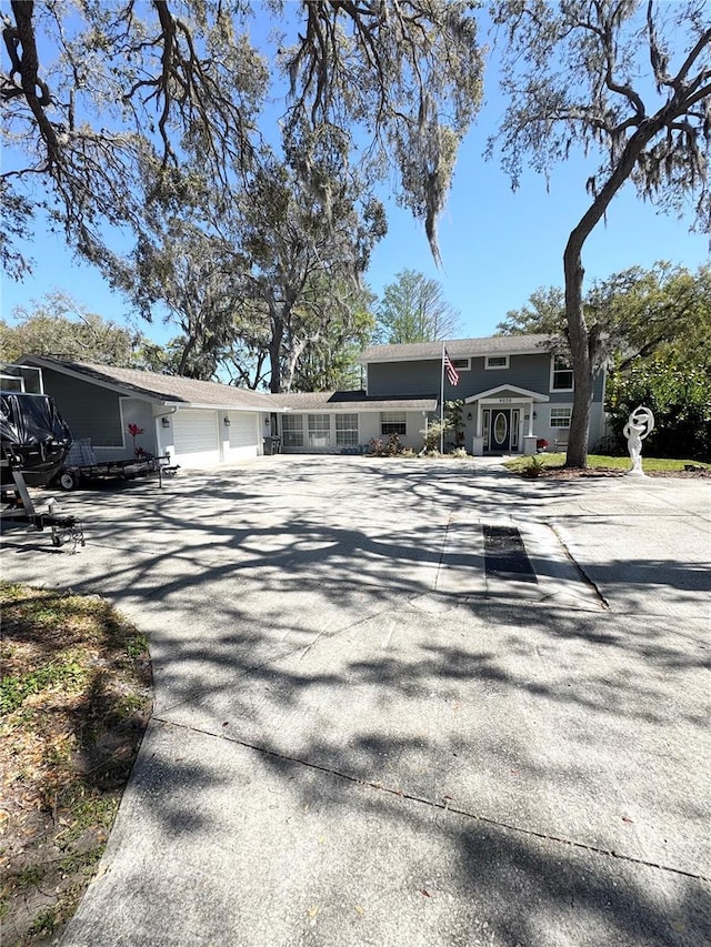 view of front of house with a garage and driveway