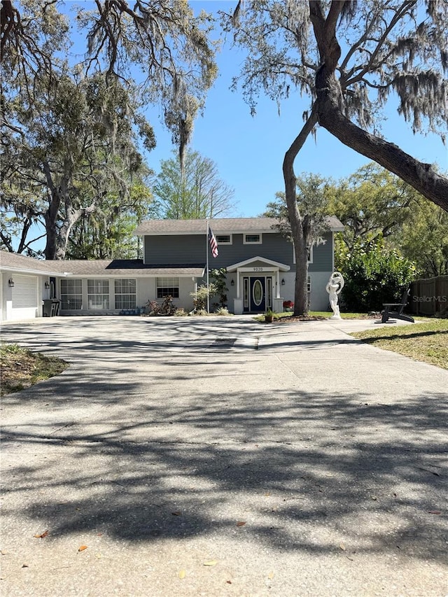 view of front facade featuring an attached garage and driveway