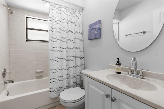 bathroom featuring vanity, toilet, and shower / bath combo with shower curtain