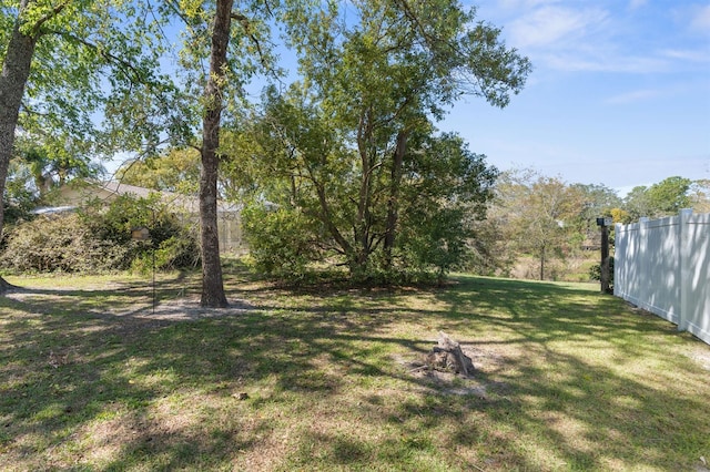 view of yard featuring fence