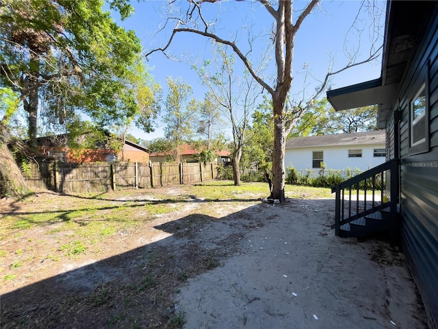 view of yard featuring fence