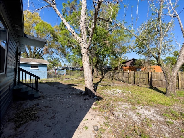 view of yard featuring fence