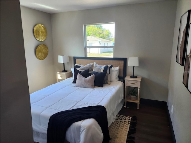 bedroom featuring wood finished floors