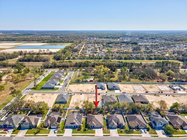 aerial view featuring a residential view and a water view