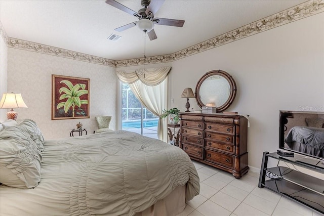 bedroom with light tile patterned floors, a ceiling fan, baseboards, visible vents, and access to outside