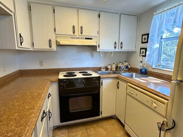 kitchen featuring light tile patterned floors, electric range, a sink, under cabinet range hood, and dishwasher