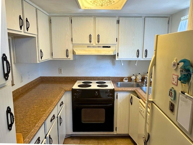 kitchen with under cabinet range hood, a sink, black electric range, freestanding refrigerator, and light tile patterned flooring