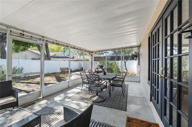 sunroom / solarium featuring plenty of natural light