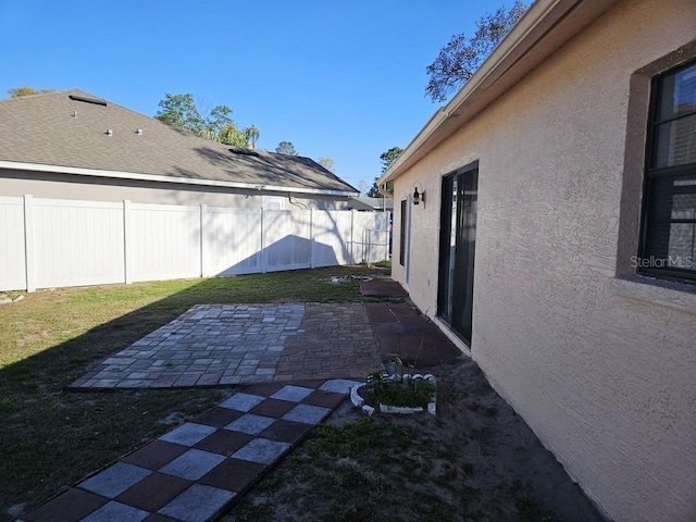 view of yard featuring a patio and fence private yard