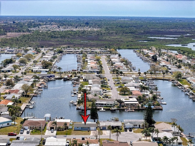 aerial view featuring a residential view and a water view