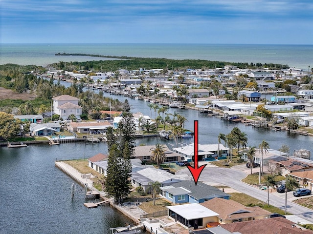 aerial view featuring a water view and a residential view