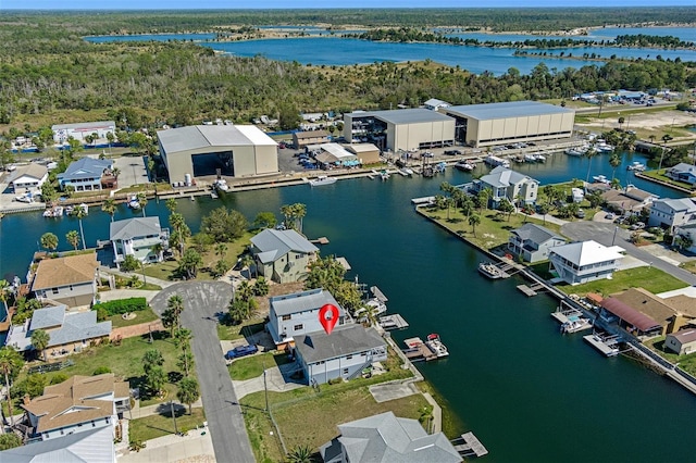 aerial view with a residential view and a water view